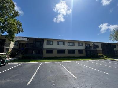 545 Trace Circle, Unit 204 Deerfield Beach, FL 33441 - Photo 10 of 10 a view of a house with a patio