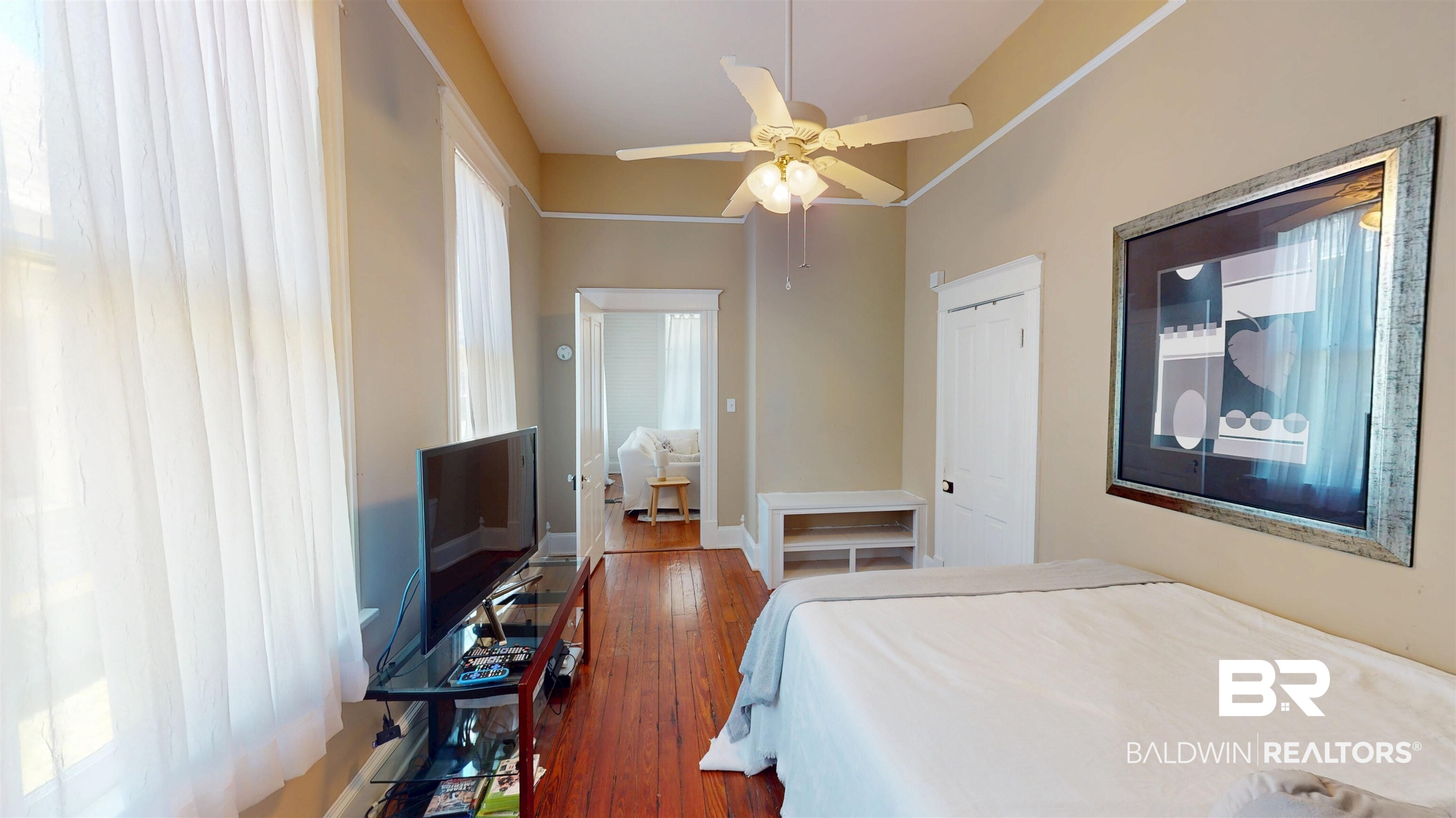 1154 New St Francis Street Mobile, AL 36604 - Photo 14 of 37 Bedroom featuring multiple windows, ceiling fan, baseboards, and wood finished floors