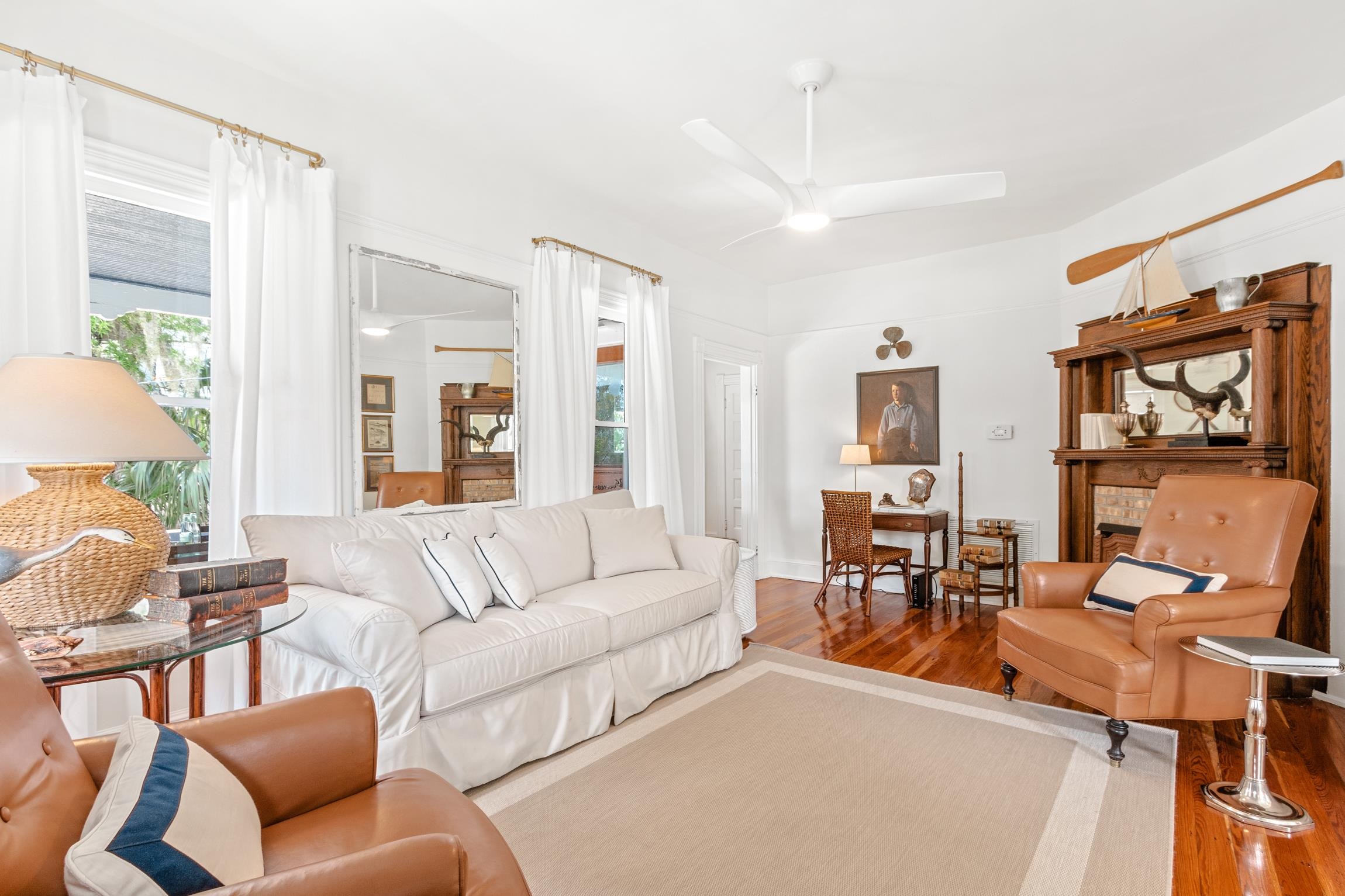 8 Sevilla Street St. Augustine, FL 32084 - Photo 21 of 73 a living room with furniture wooden floor and a large window