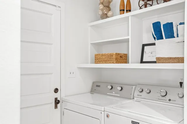 a bathroom with a shower a toilet and a sink