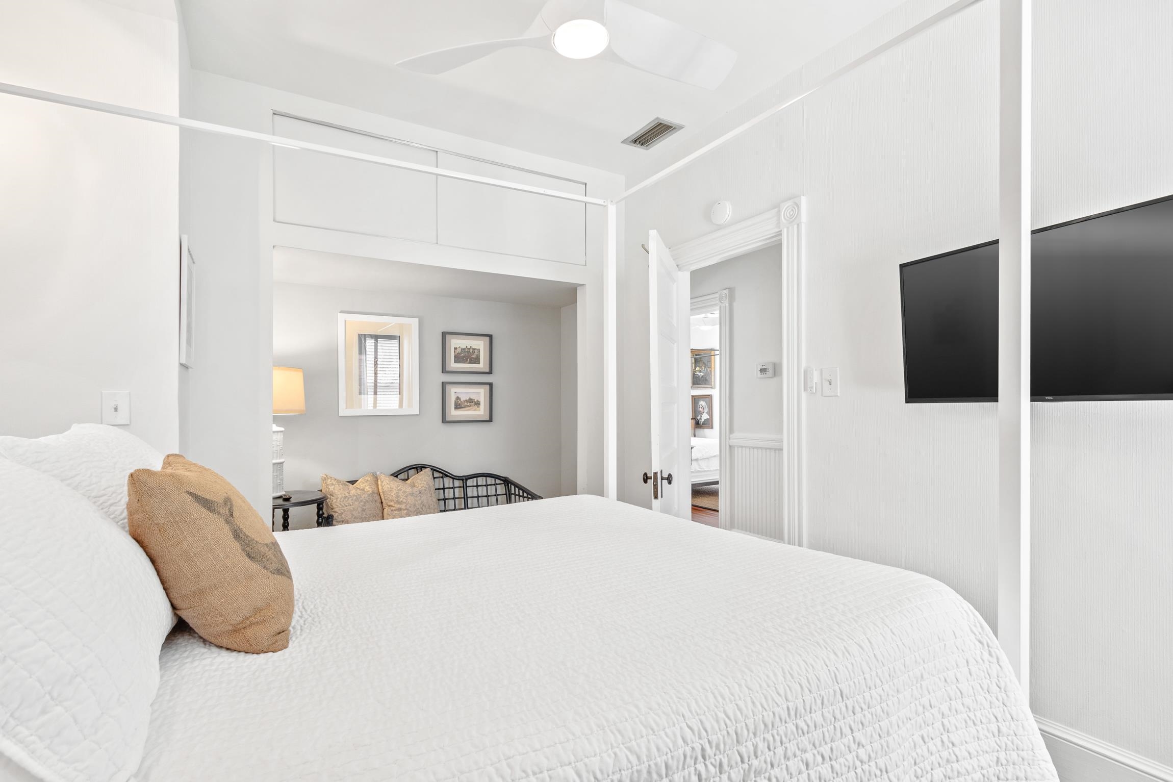 8 Sevilla Street St. Augustine, FL 32084 - Photo 29 of 73 a bedroom with a bed and a night stand