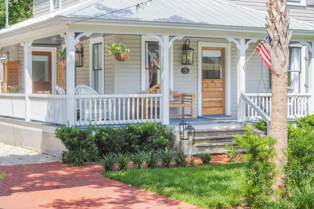a front view of a house with a porch