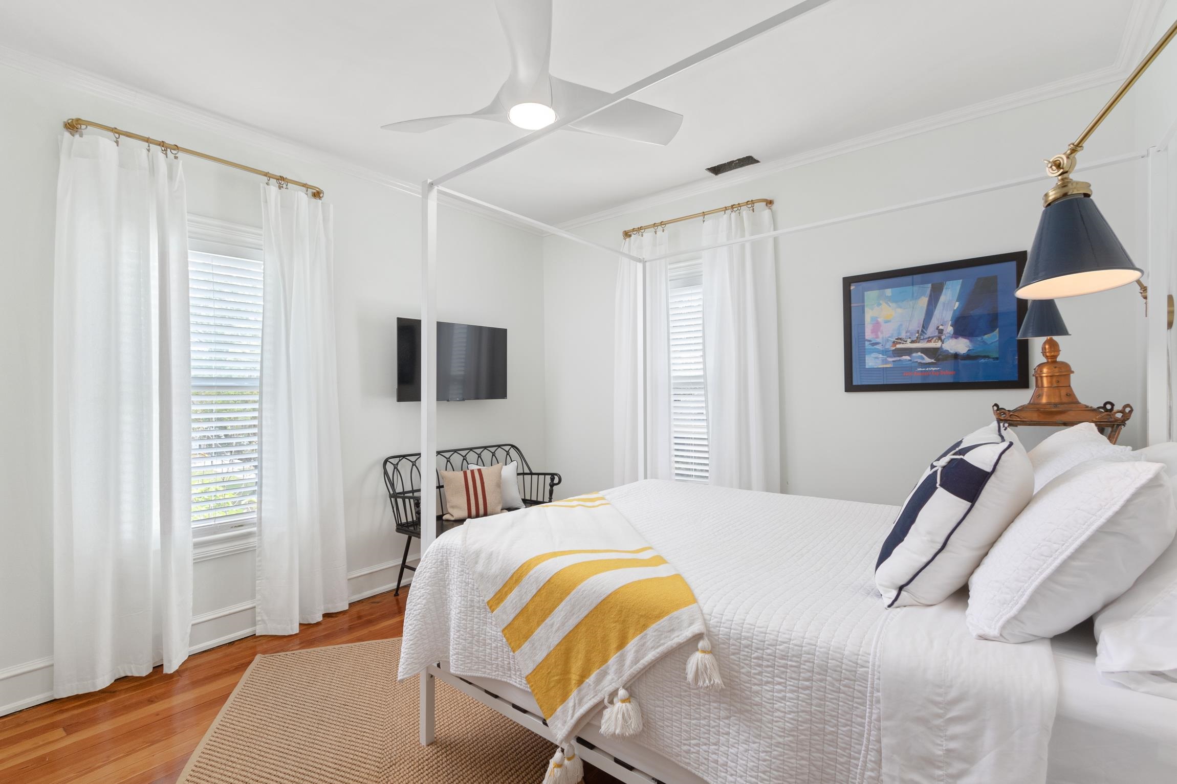 8 Sevilla Street St. Augustine, FL 32084 - Photo 35 of 73 a bedroom with a bed flat screen tv and a window