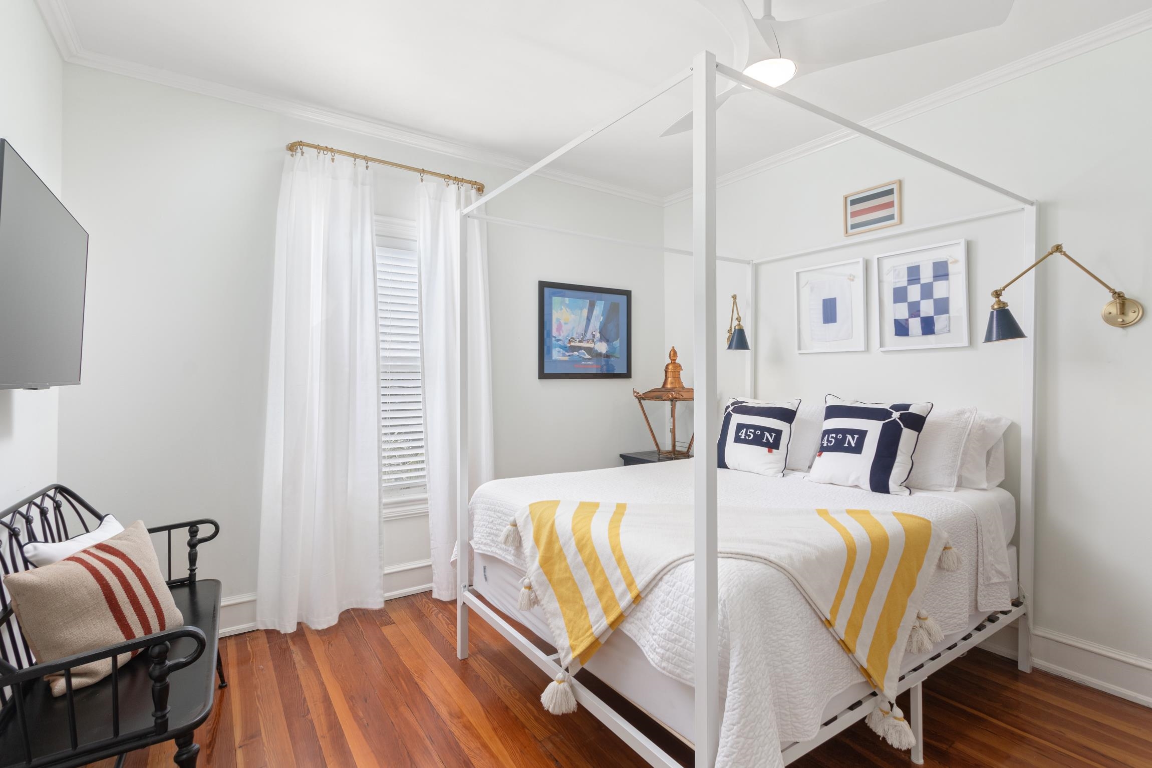 8 Sevilla Street St. Augustine, FL 32084 - Photo 36 of 73 a bedroom with a bed and wooden floor