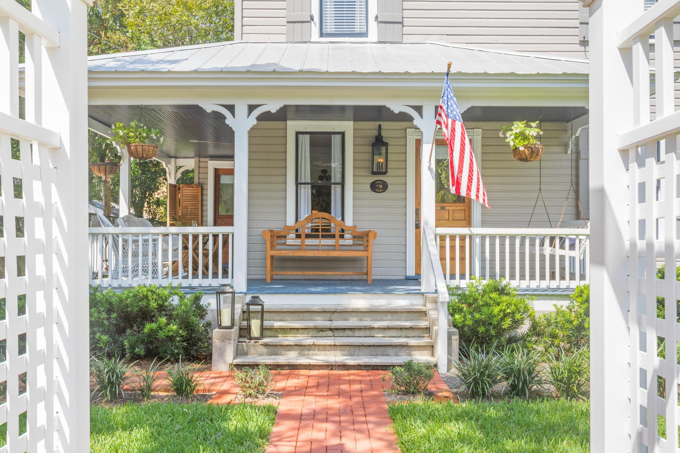 8 Sevilla Street St. Augustine, FL 32084 - Photo 4 of 73 a front view of a house with a porch
