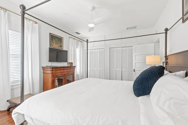 a view of a chairs and table in backyard