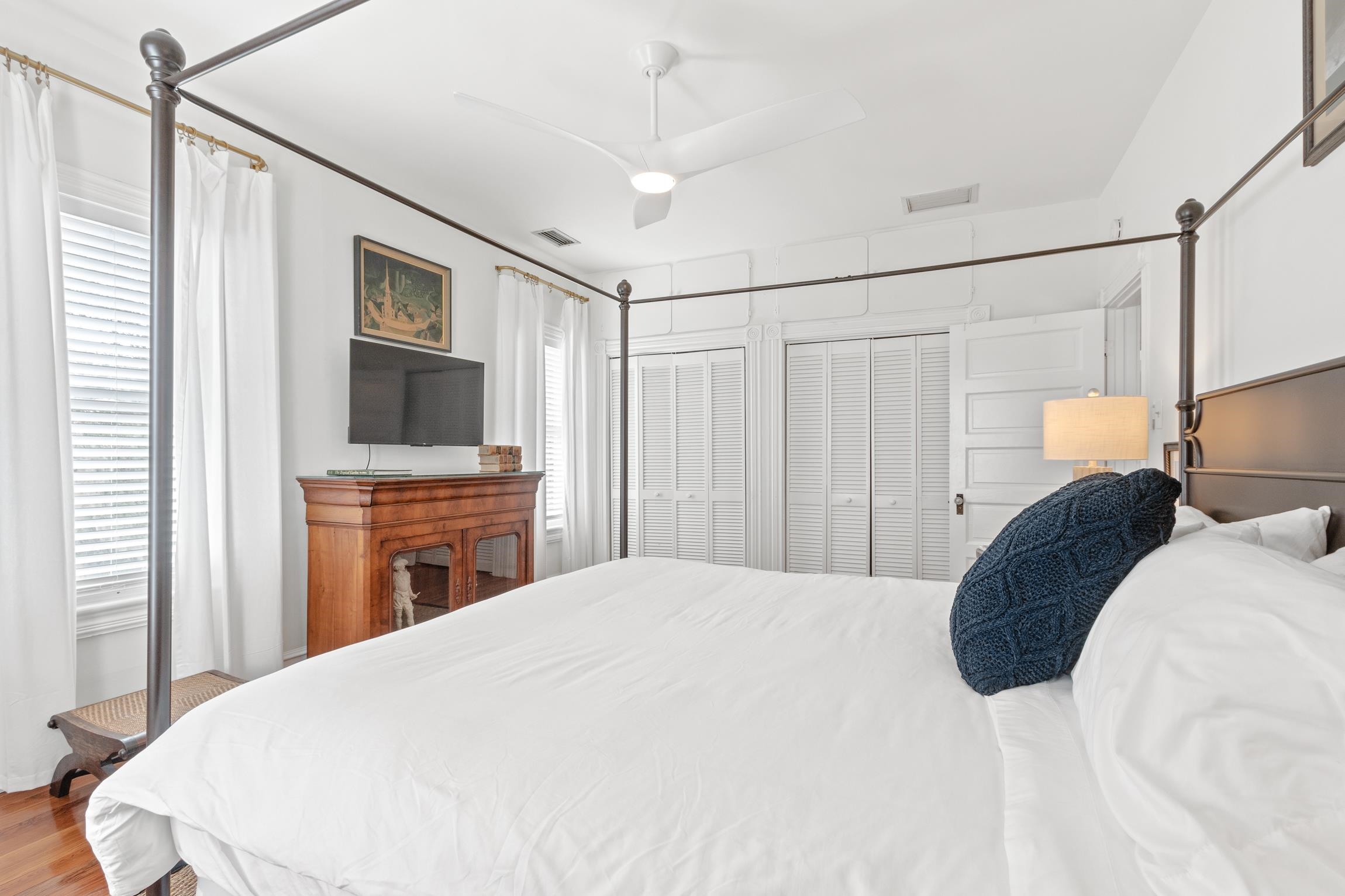 8 Sevilla Street St. Augustine, FL 32084 - Photo 41 of 73 a bedroom with a bed and a flat screen tv