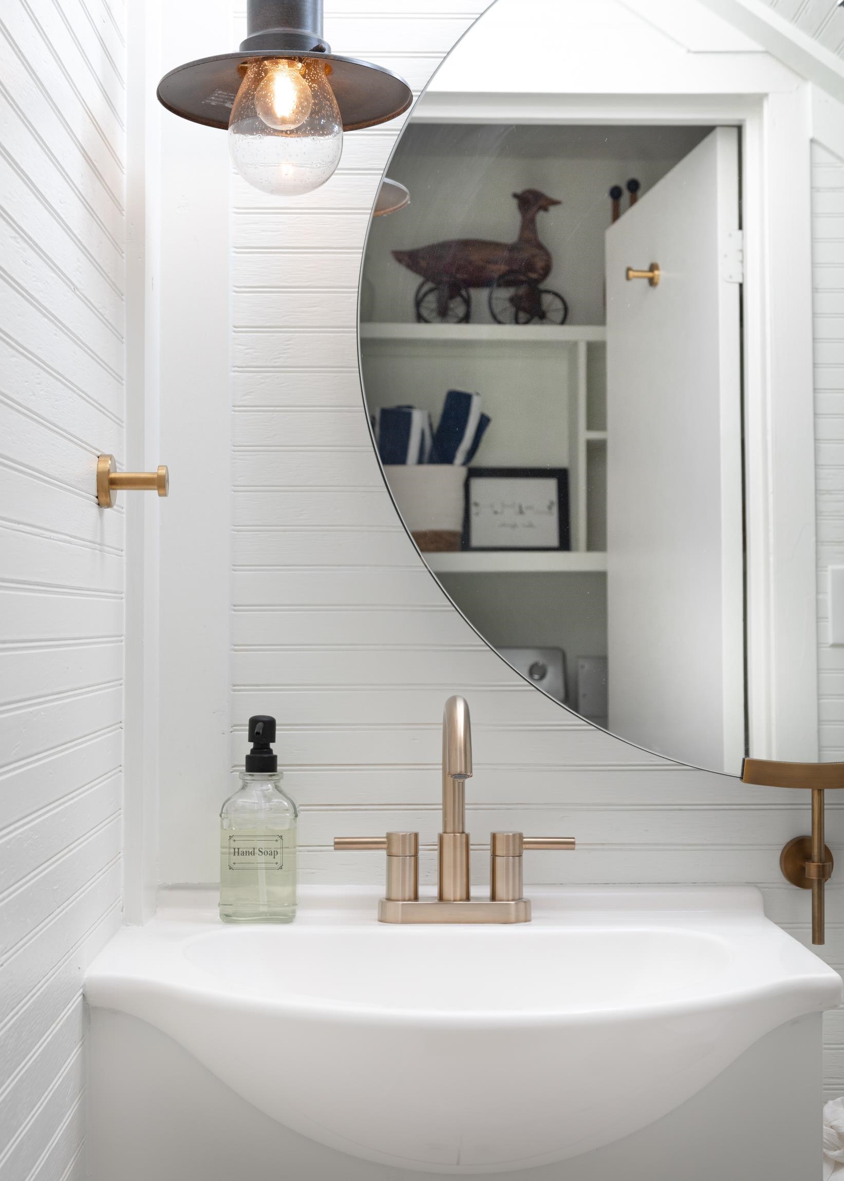 8 Sevilla Street St. Augustine, FL 32084 - Photo 44 of 73 a bathroom with a sink and a mirror