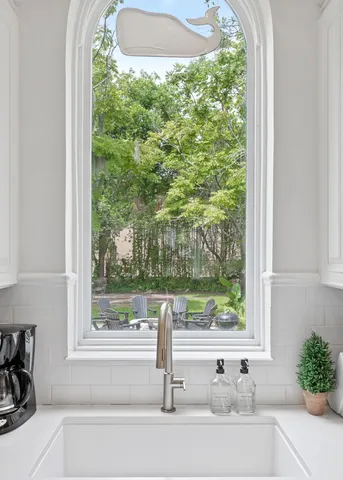 a view of outdoor chair and table in the balcony