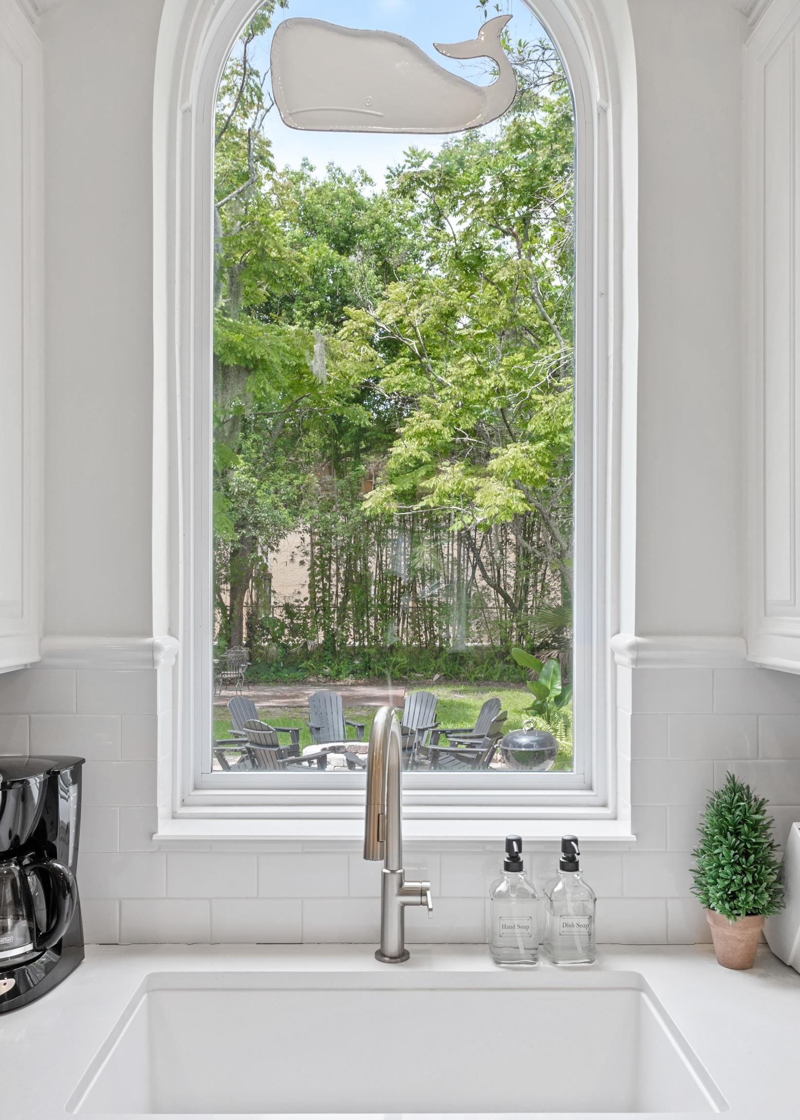 8 Sevilla Street St. Augustine, FL 32084 - Photo 45 of 73 a view of a sink and a table in a kitchen