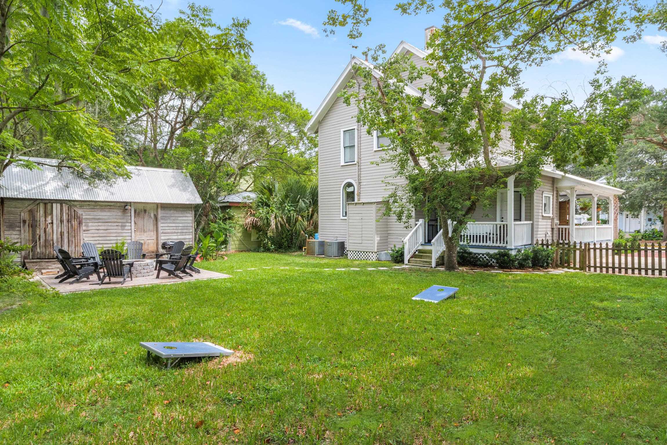 8 Sevilla Street St. Augustine, FL 32084 - Photo 57 of 73 a front view of a house with garden