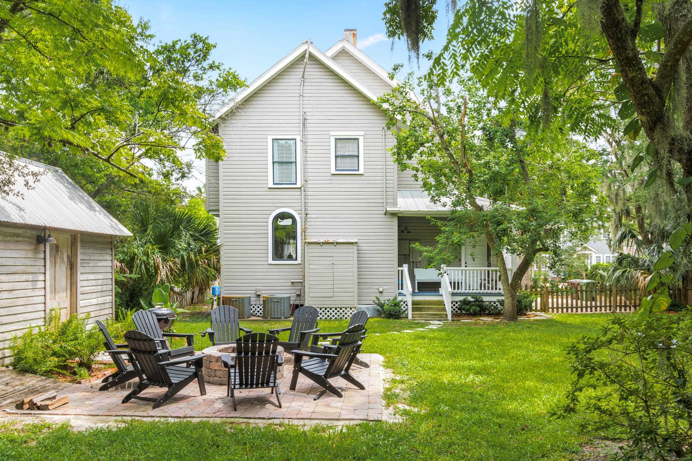 8 Sevilla Street St. Augustine, FL 32084 - Photo 59 of 73 a view of a house with backyard sitting area and garden