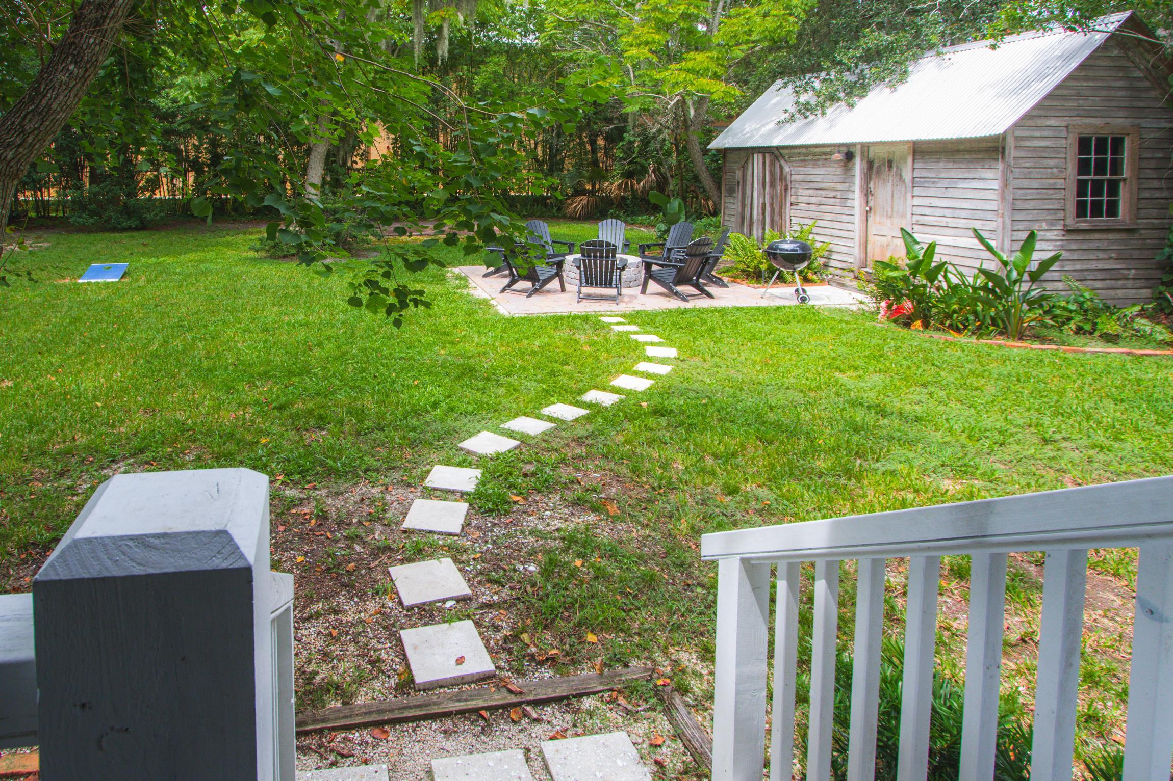 8 Sevilla Street St. Augustine, FL 32084 - Photo 61 of 73 a view of a house with backyard sitting area and garden