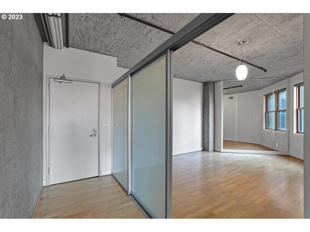 411 Northwest Flanders Street, Unit 401 Portland, OR 97209 - Photo 16 of 38 a view interior of a house with an empty space