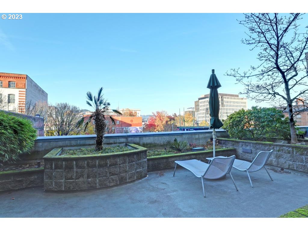 411 Northwest Flanders Street, Unit 401 Portland, OR 97209 - Photo 34 of 38 a view of outdoor sitting space with furniture