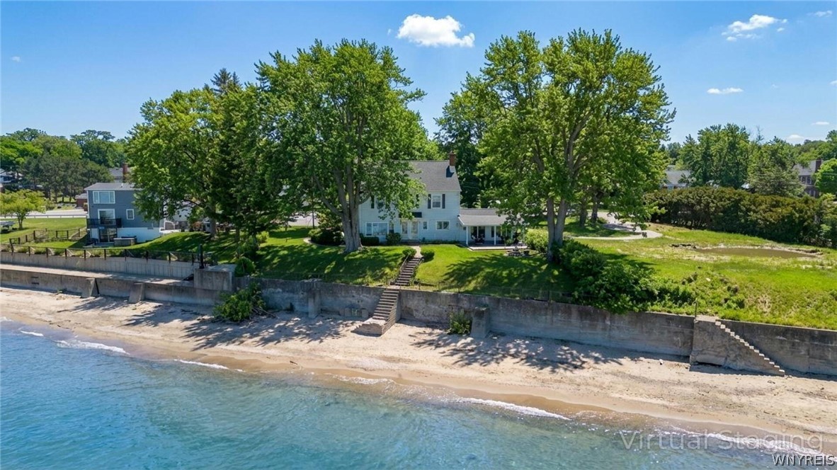 4998 Lake Shore Road Hamburg, NY 14075 - Photo 2 of 44 THIS IS VIRTUALLY STAGE TO SHOW WATER/BEACH