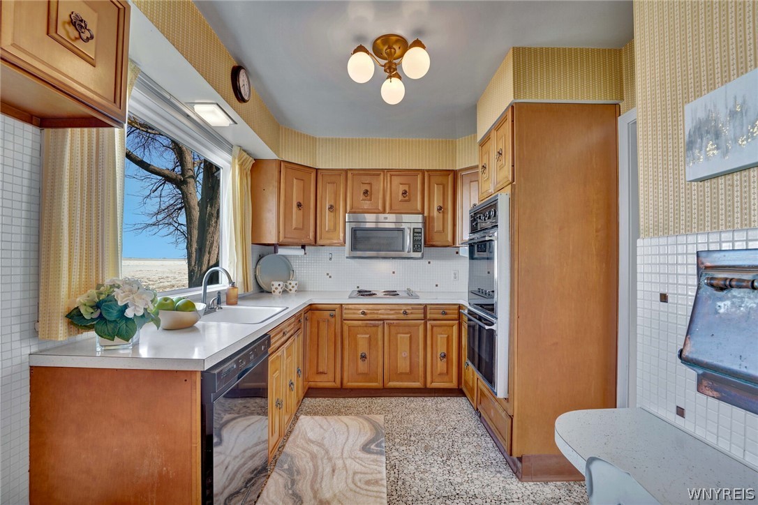 4998 Lake Shore Road Hamburg, NY 14075 - Photo 23 of 44 SOLID WOOD CABINETRY - NICE LARGE WINDOW TO LOOK O