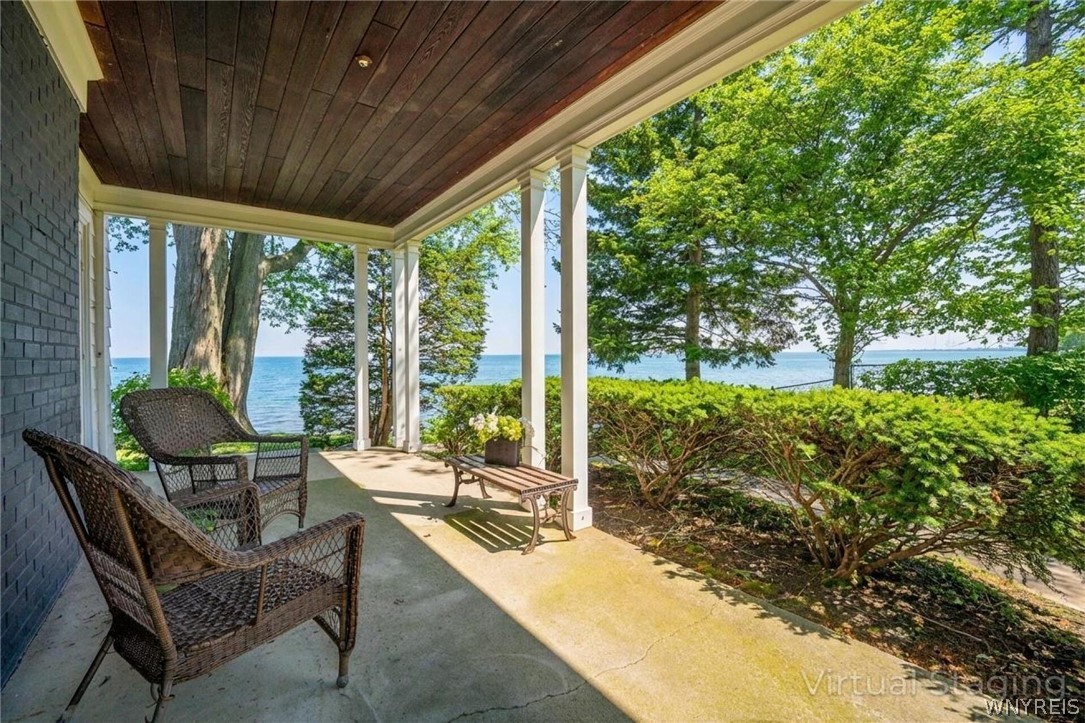 4998 Lake Shore Road Hamburg, NY 14075 - Photo 10 of 44 SIDE VERAND WITH ENTRY FROM LIVING ROOM FRENCH DOO