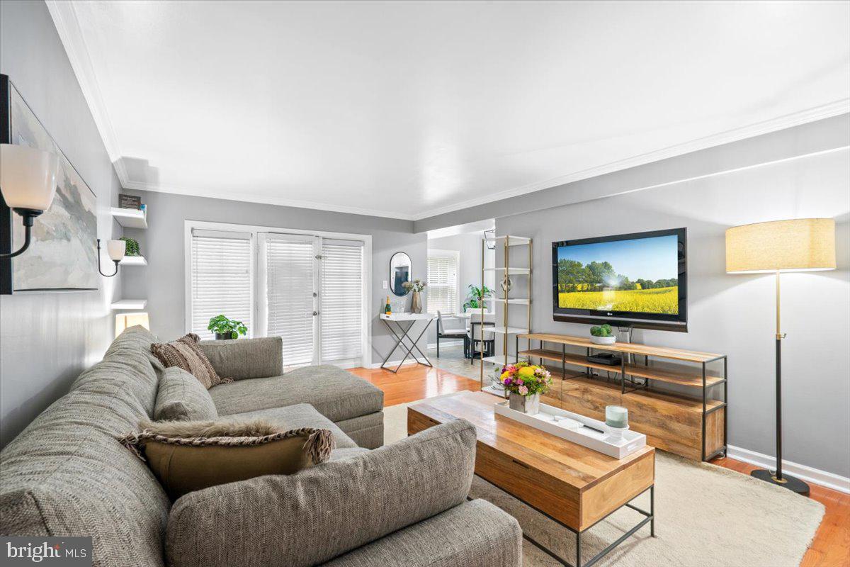 3332 Spring Lane, Unit C10 Falls Church, VA 22041 - Photo 11 of 25 a living room with furniture and a flat screen tv
