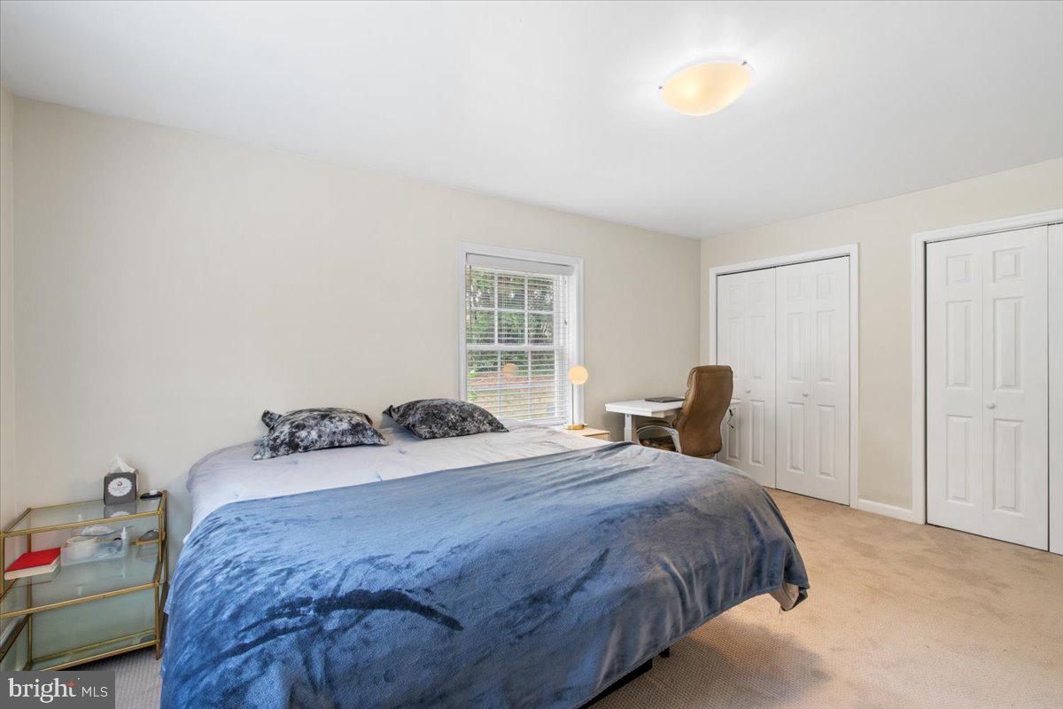 3332 Spring Lane, Unit C10 Falls Church, VA 22041 - Photo 21 of 25 a bedroom with a bed and a window