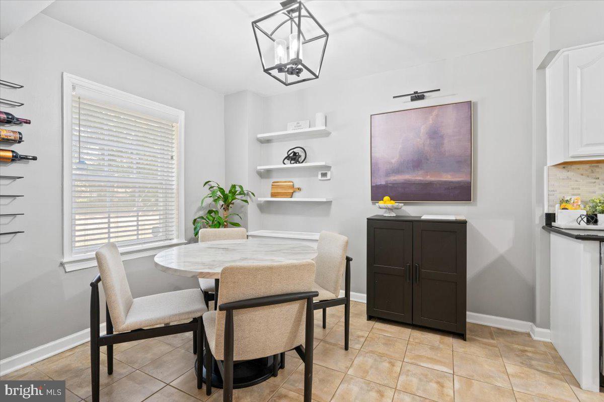 3332 Spring Lane, Unit C10 Falls Church, VA 22041 - Photo 9 of 25 a dining room with furniture and window