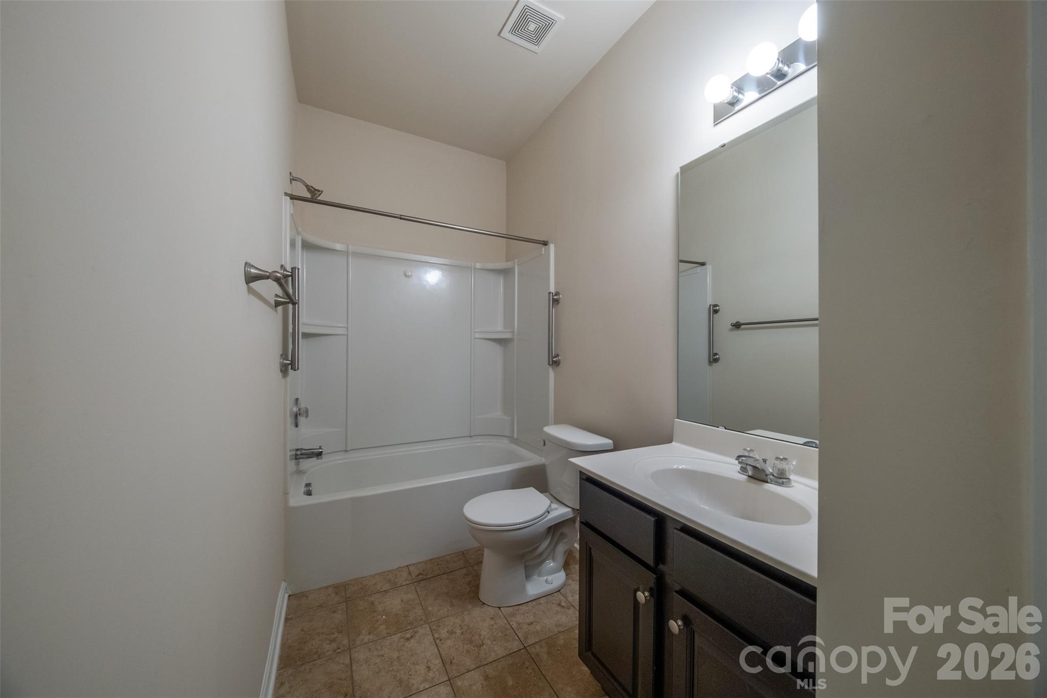 3006 Houndscroft Road Indian Trail, NC 28079 - Photo 21 of 39 a bathroom with a sink a toilet and shower