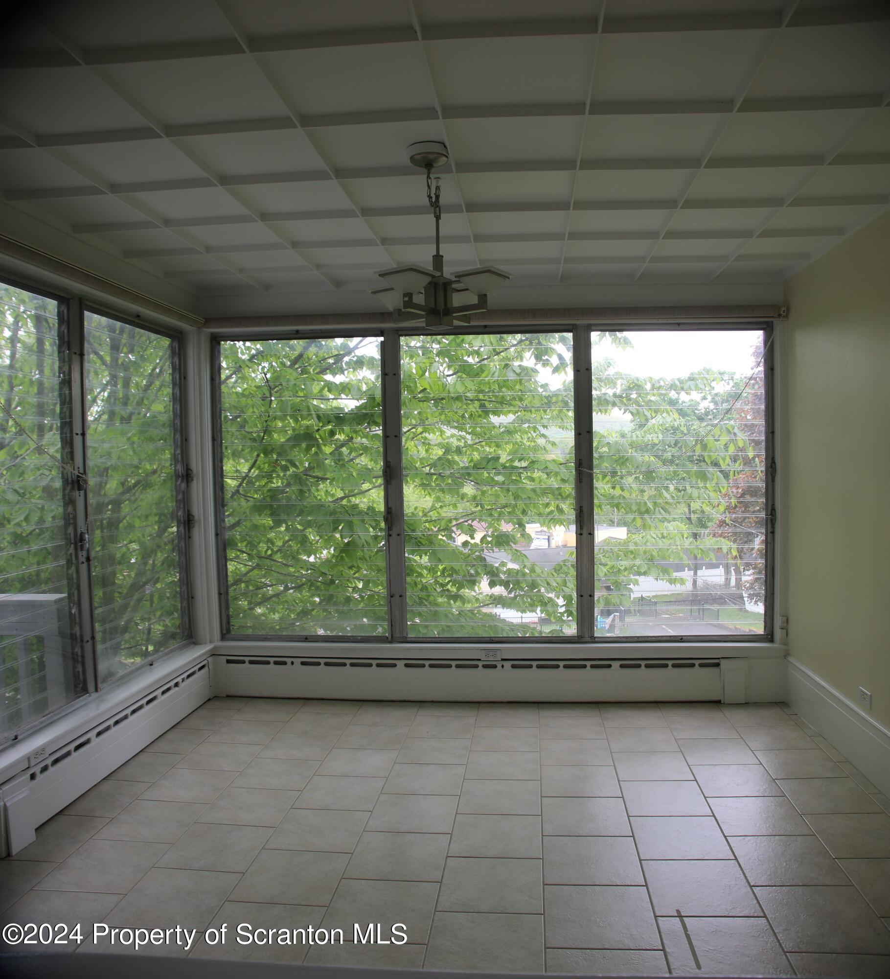 113 Knapp Road Clarks Summit, PA 18411 - Photo 11 of 57 8-sunporch
