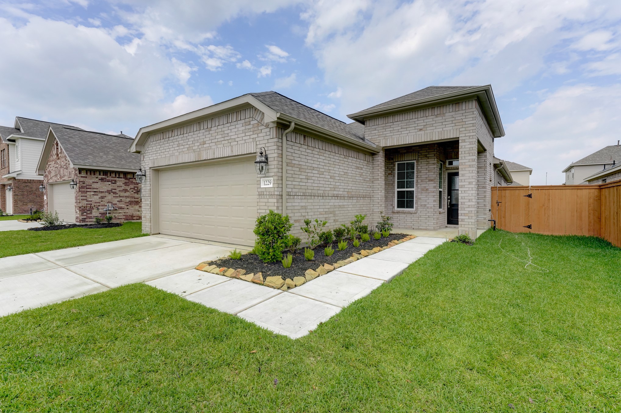 1229 Red Hills Drive Rosharon, TX 77583 - Photo 1 of 29 a front view of house with yard and green space