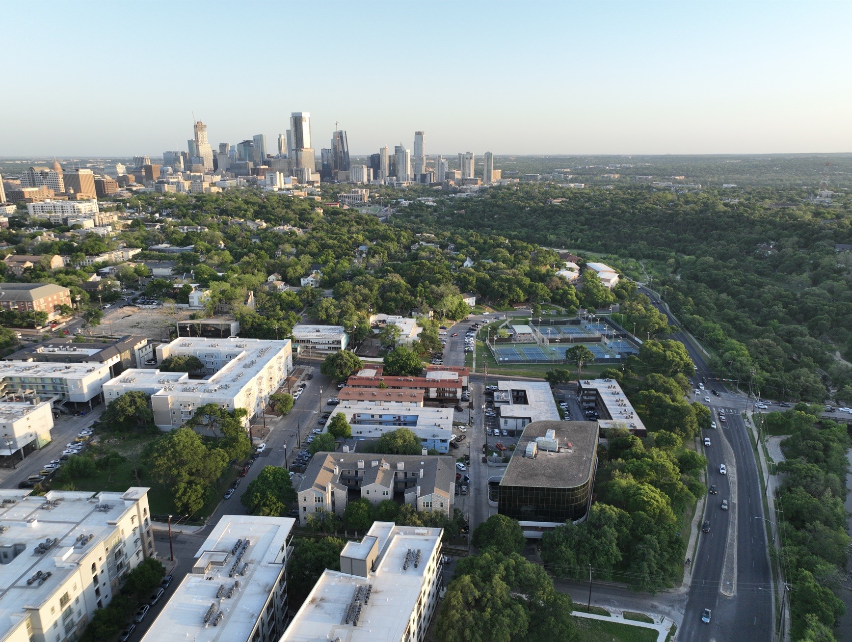 2414 Longview Street, Unit 202 Austin, TX 78705 - Photo 1 of 17 an aerial view of a city with lots of residential buildings