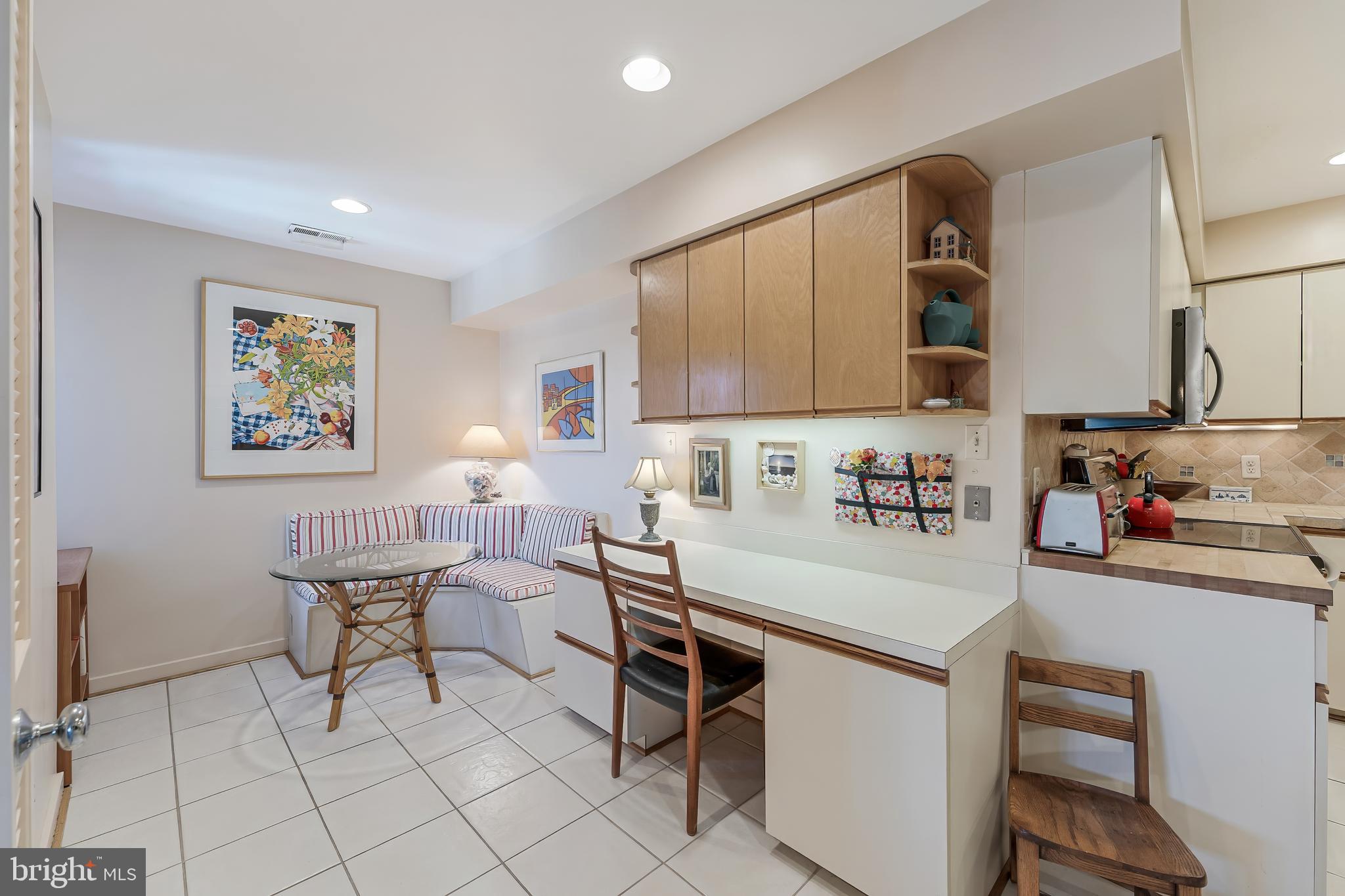 11500 Fairway Drive, Unit 507 Reston, VA 20190 - Photo 19 of 41 a room with furniture a rug and a window