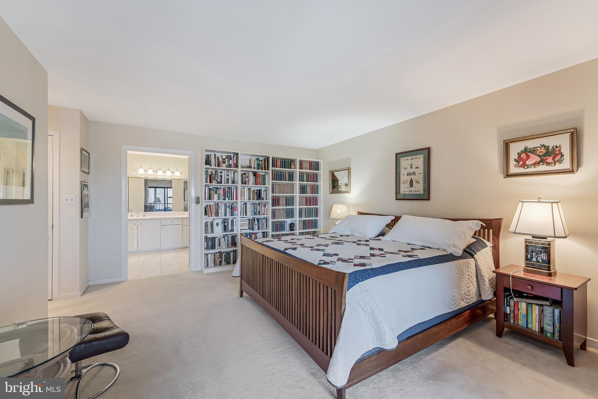 11500 Fairway Drive, Unit 507 Reston, VA 20190 - Photo 25 of 41 a bedroom with a bed and a window