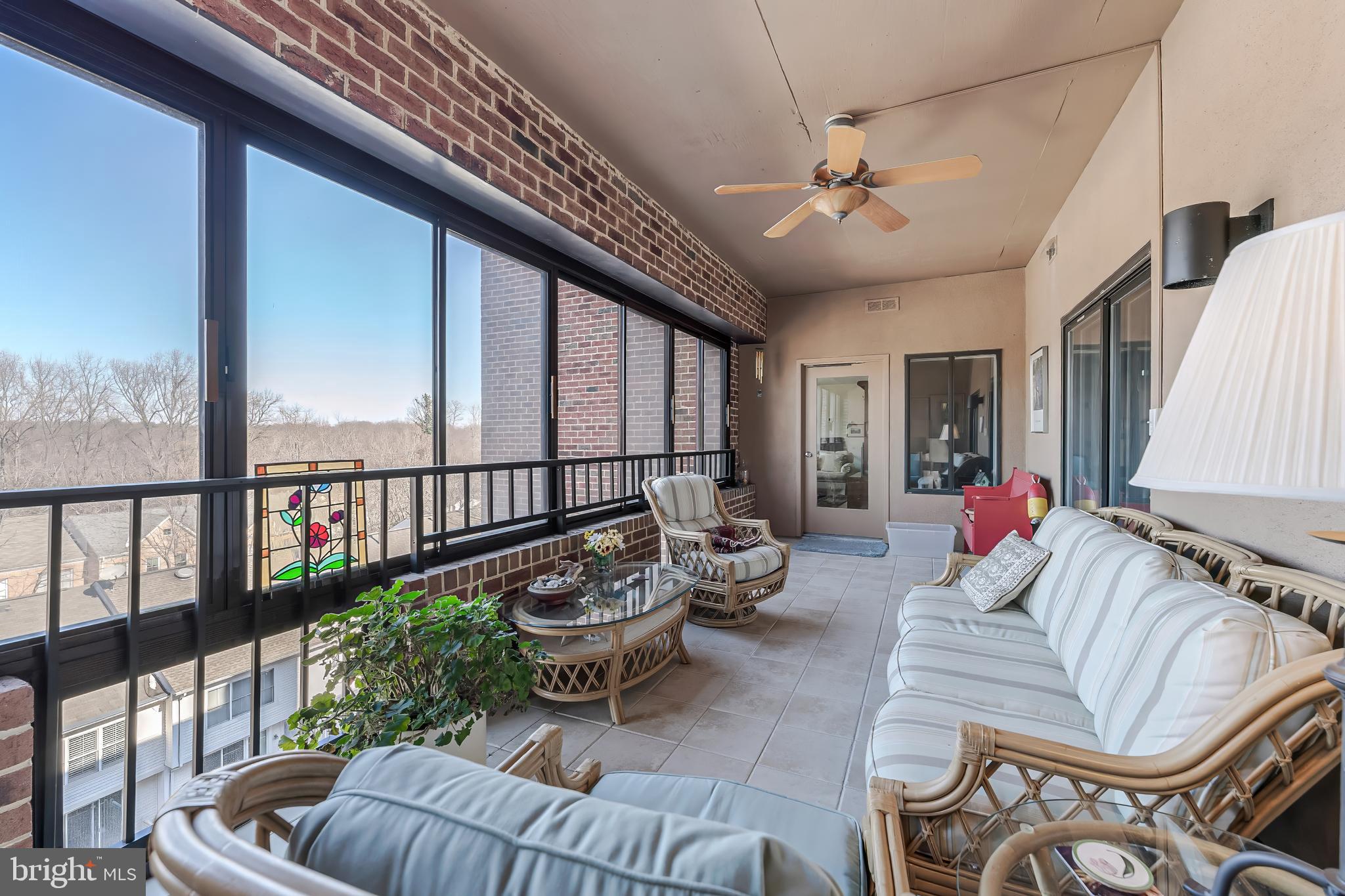 11500 Fairway Drive, Unit 507 Reston, VA 20190 - Photo 37 of 41 a living room with furniture and a large window