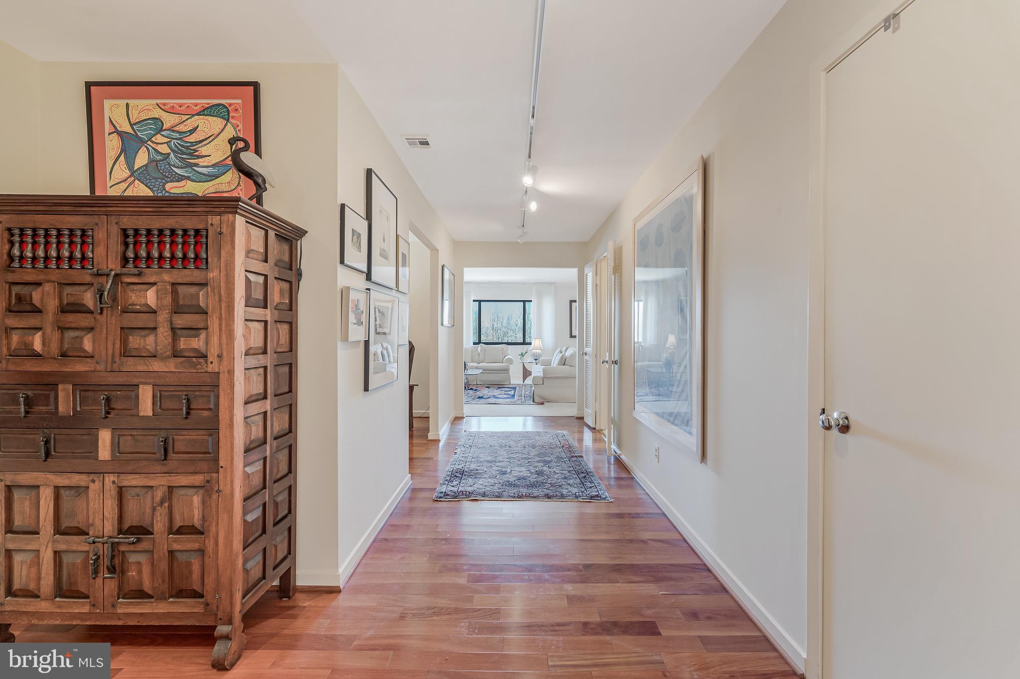 11500 Fairway Drive, Unit 507 Reston, VA 20190 - Photo 4 of 41 a view of hallway with wooden floor