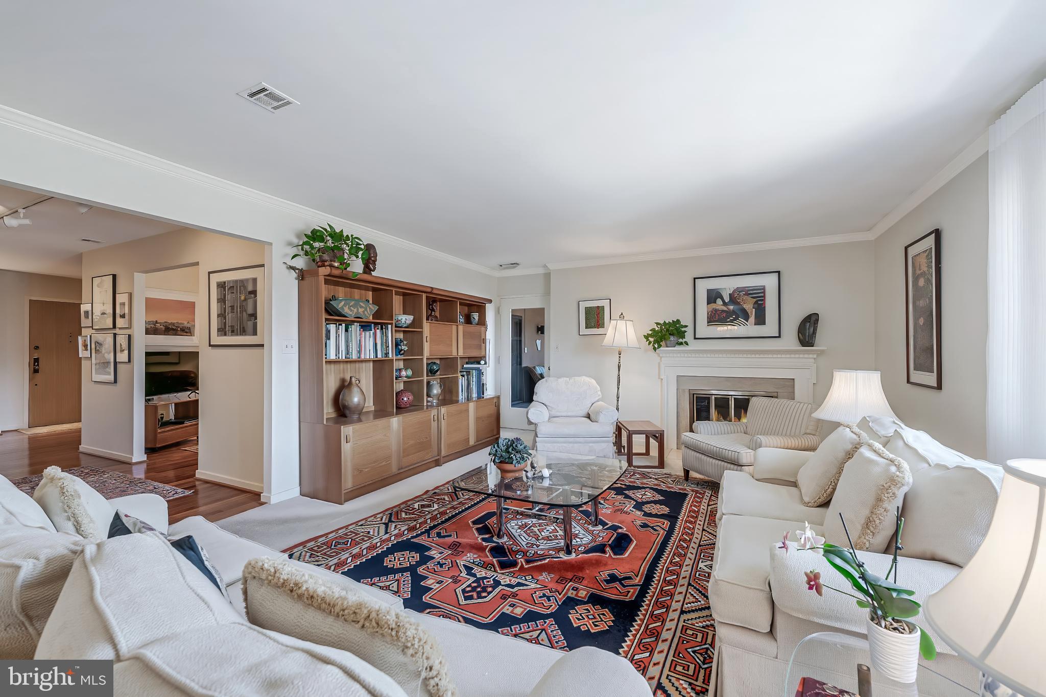 11500 Fairway Drive, Unit 507 Reston, VA 20190 - Photo 7 of 41 a living room with furniture and a table