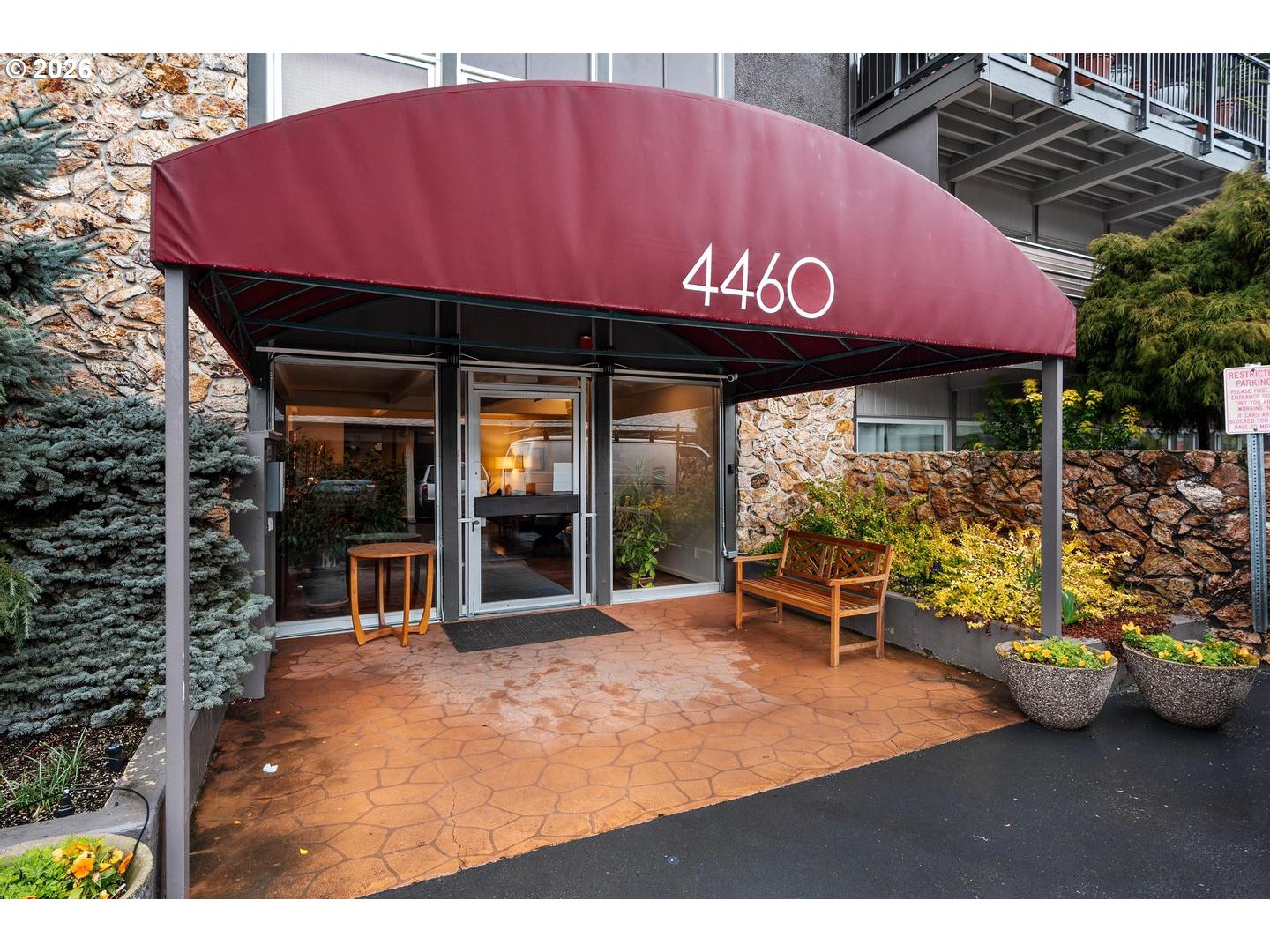 a view of a chairs and table in the patio