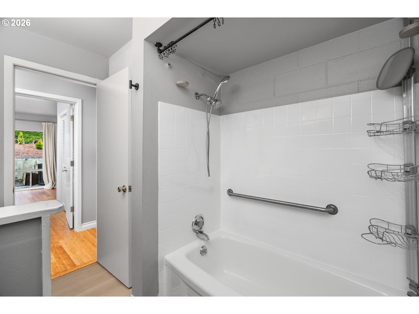 4460 Southwest Scholls Ferry Road, Unit 8 Portland, OR 97225 - Photo 22 of 31 a bathroom with a shower and a sink
