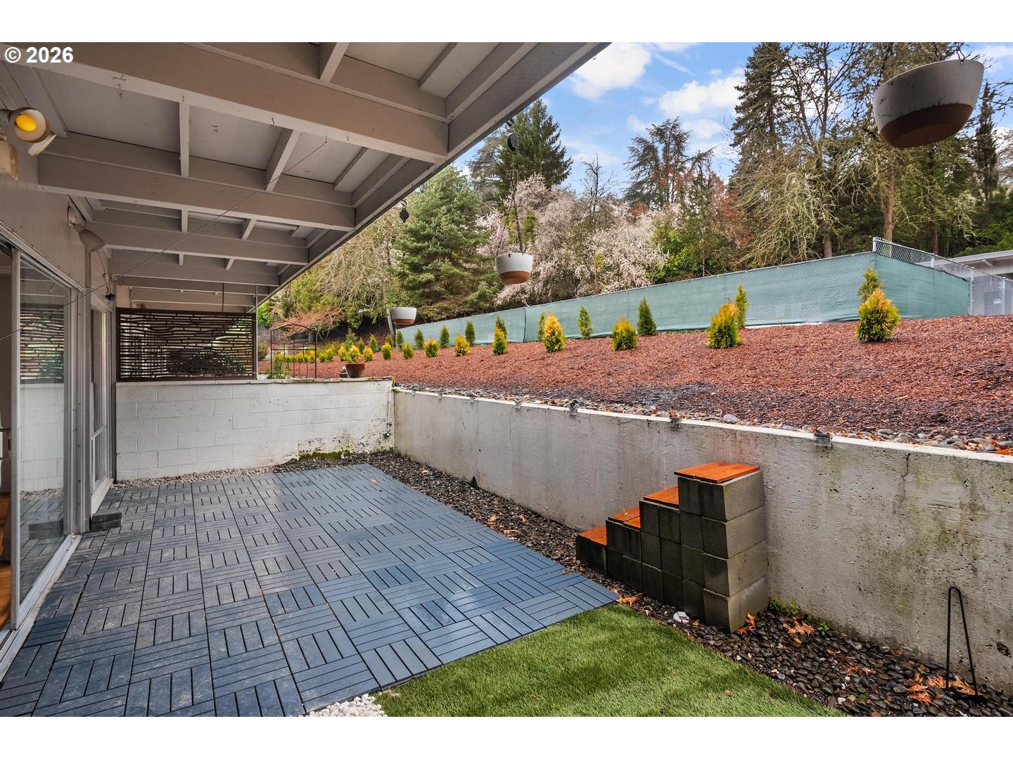4460 Southwest Scholls Ferry Road, Unit 8 Portland, OR 97225 - Photo 25 of 31 a view of a backyard