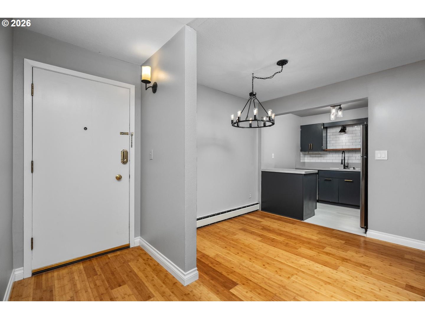4460 Southwest Scholls Ferry Road, Unit 8 Portland, OR 97225 - Photo 7 of 31 a view of a livingroom with a kitchen