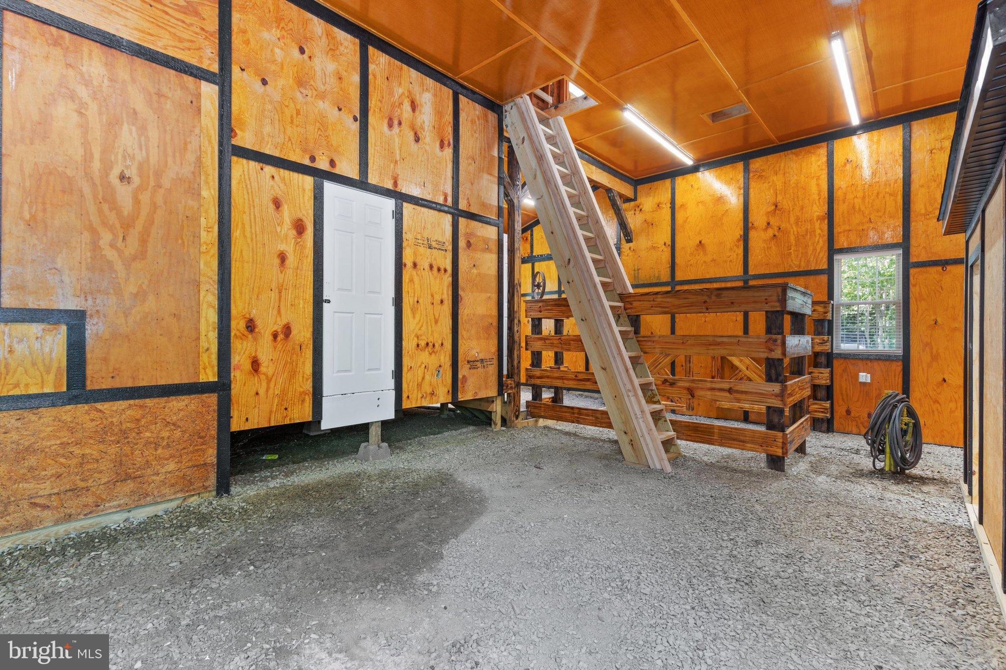 0 Flat Iron Road Montross, VA 22520 - Photo 23 of 116 Spacious interior with vibrant wooden walls.