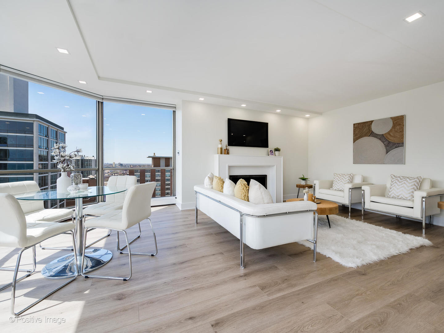 1310 North Ritchie Court, Unit 27B Chicago, IL 60610 - Photo 11 of 29 a living room with furniture and a flat screen tv