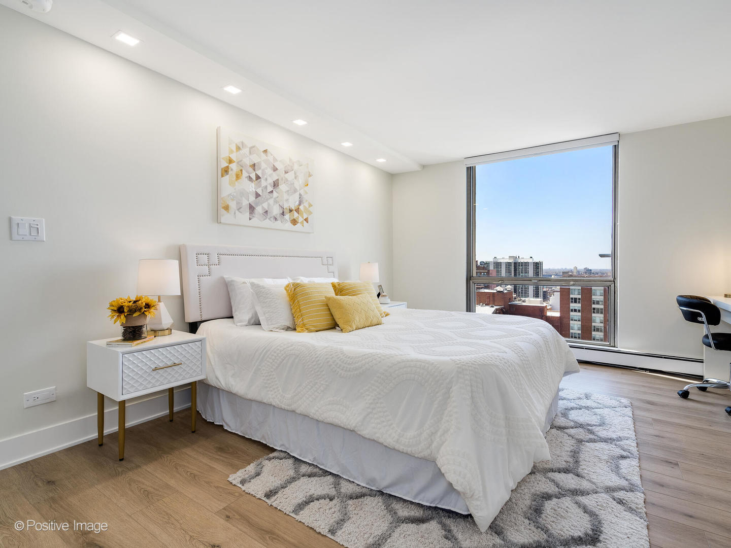 1310 North Ritchie Court, Unit 27B Chicago, IL 60610 - Photo 14 of 29 a bedroom with a bed and a window