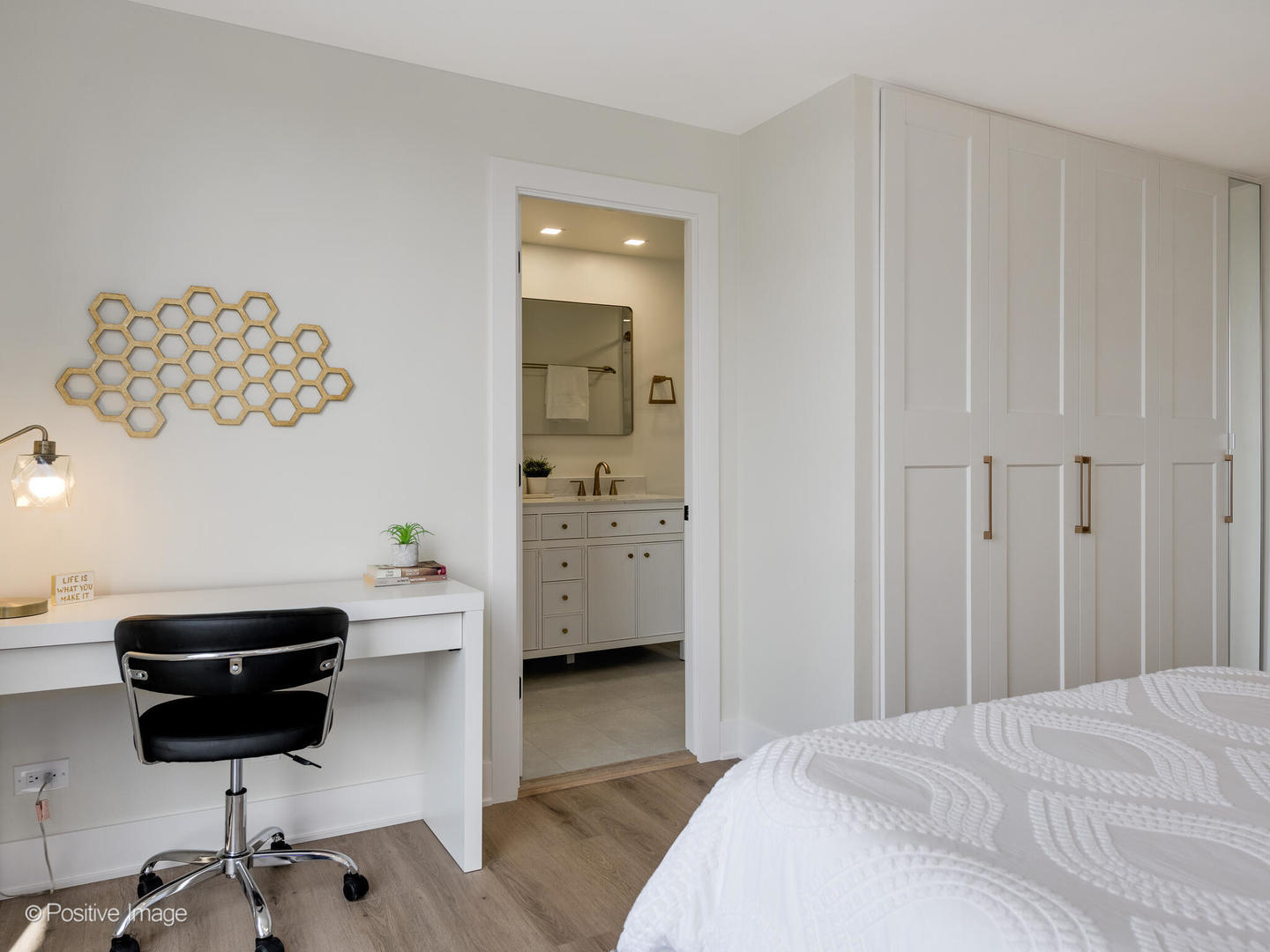 1310 North Ritchie Court, Unit 27B Chicago, IL 60610 - Photo 17 of 29 a bedroom with a bed and a chair