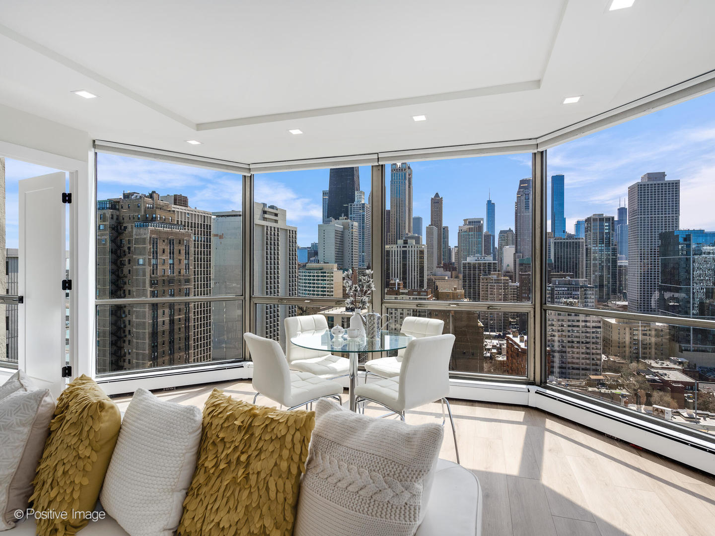 1310 North Ritchie Court, Unit 27B Chicago, IL 60610 - Photo 8 of 29 a living room with furniture and a large window