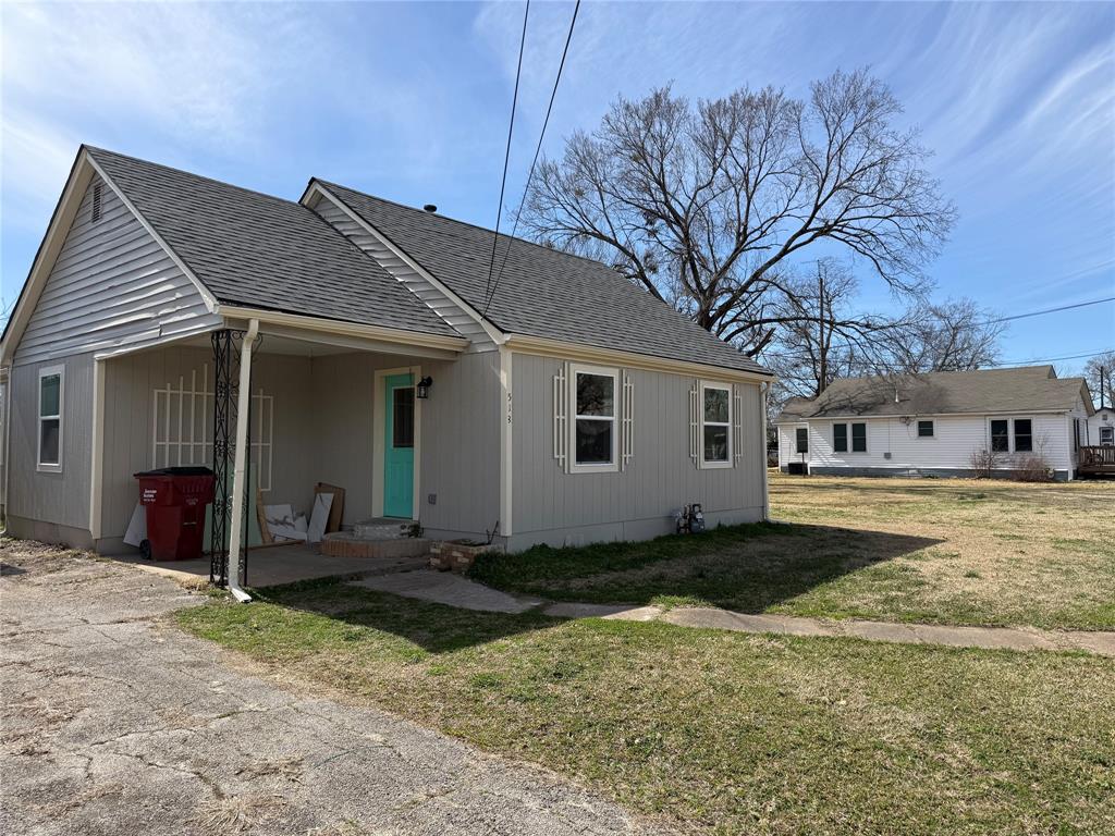 513 Allen Avenue Bonham, TX 75418 - Photo 1 of 1 a front view of house with yard