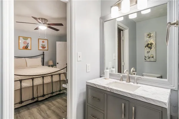 a bathroom with a sink and a mirror