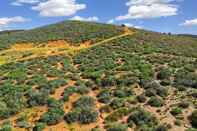 an aerial view of a multi story parking space
