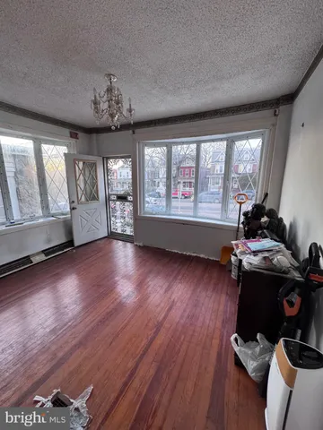 a room with furniture window and wooden floor