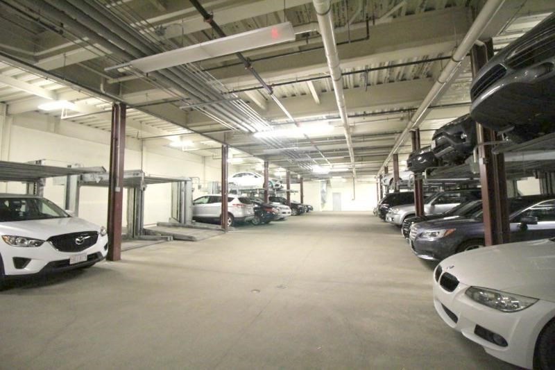 533 Cambridge Street, Unit 105 Boston, MA 02134 - Photo 30 of 32 a view of parking garage with cars