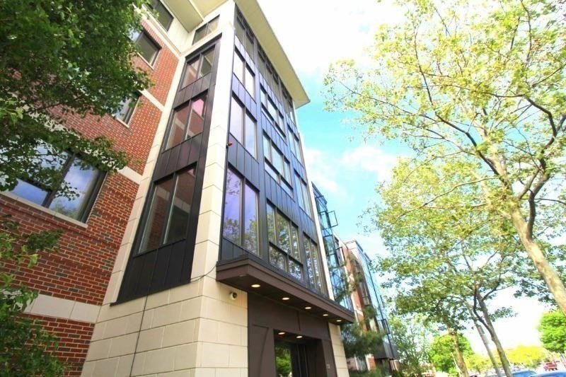 533 Cambridge Street, Unit 105 Boston, MA 02134 - Photo 3 of 32 a street view of a building