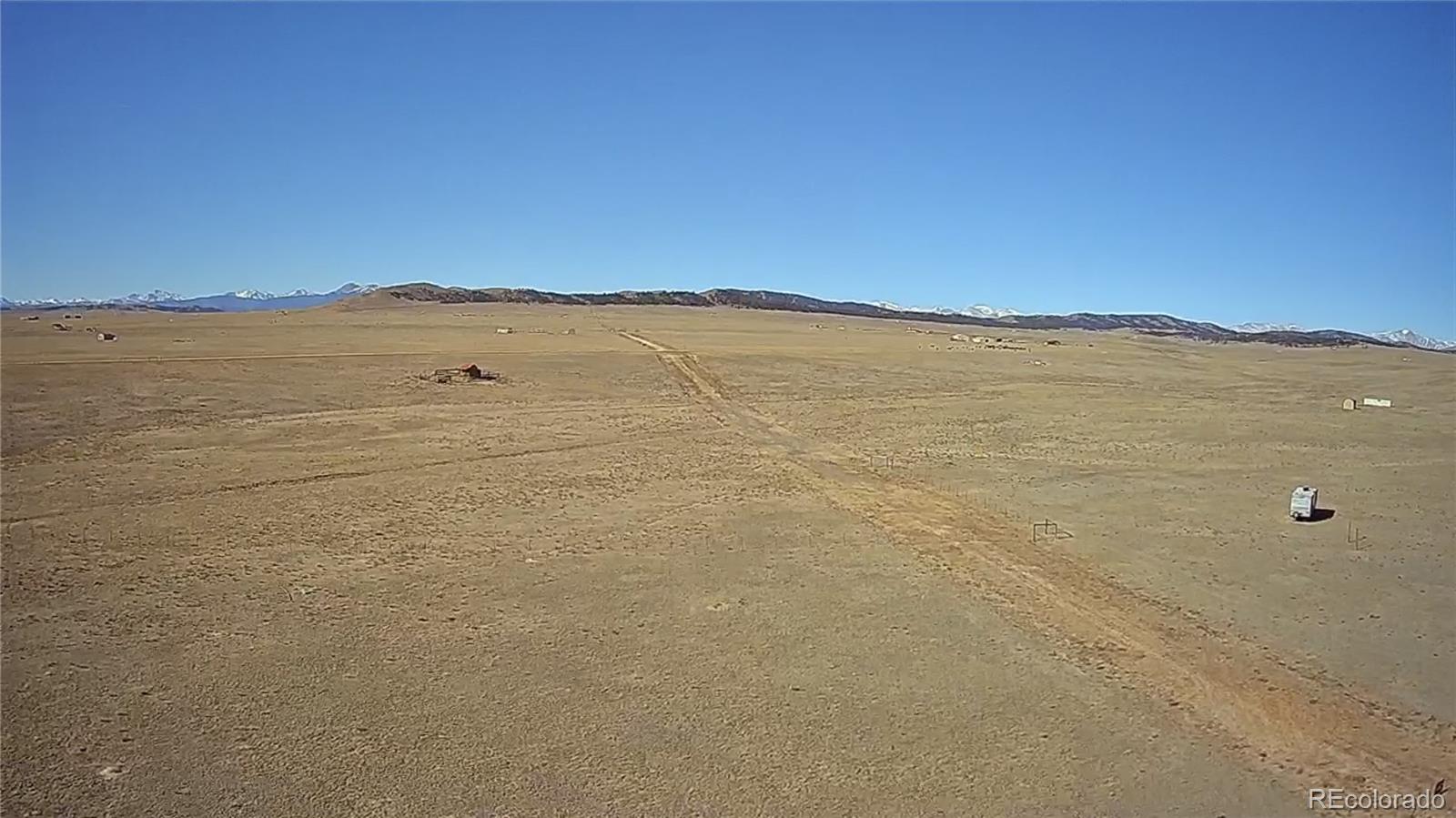 7620 Clear Creek Road Hartsel, CO 80449 - Photo 4 of 26 a view of an ocean beach and mountain